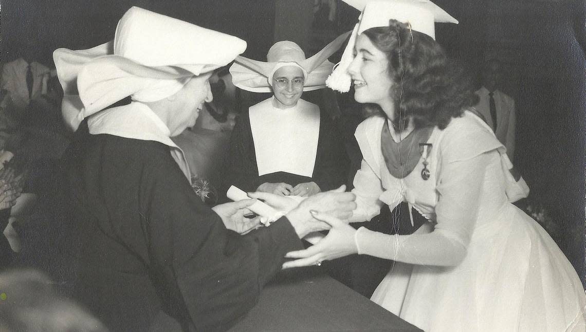 Sister Hilda Alonso, center, in the 1950s, during a graduation ceremony at the Colegio La Inmaculada in Havana.