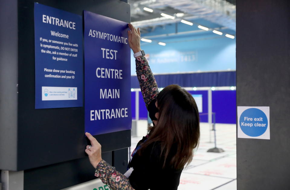 An employee attends testing of a lateral flow antigen test facility, amid the spread of the coronavirus disease (COVID-19), in St Andrews, Scotland, Britain, November 27, 2020. REUTERS/Russell Cheyne