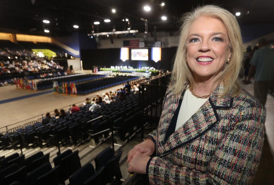 Lynn Flanders, new director of the Ocean Center, overlooks the recent graduation ceremony for Embry-Riddle Aeronautical University. "It was love at first sight," she says of the job and destination that lured her away from her lifetime home in Atlanta.