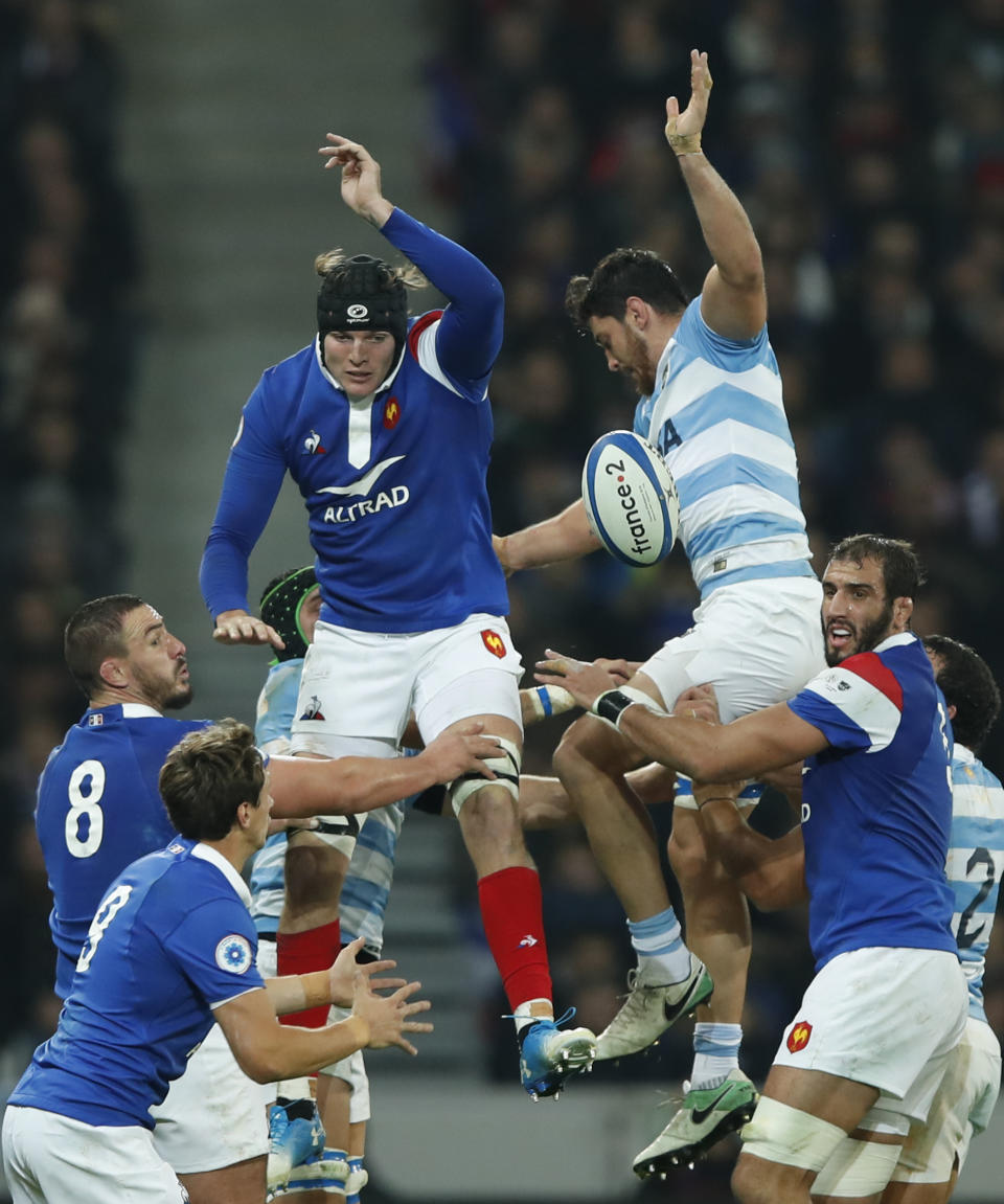 France's Arthur Iturria, left, and Argentina's Guido Petti jump in a line out during their rugby union international match between France and Argentina at the Pierre Mauroy stadium, in Lille, northern France, Saturday, Nov. 17, 2018. (AP Photo/Christophe Ena)