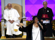 FILE - In this Sept. 26, 2015 file photo, Aretha Franklin performs as Pope Francis is seated left, looks on during the Festival of Families in Philadelphia. Franklin died Thursday, Aug. 16, 2018 at her home in Detroit. She was 76. (AP Photo/Matt Slocum, File)