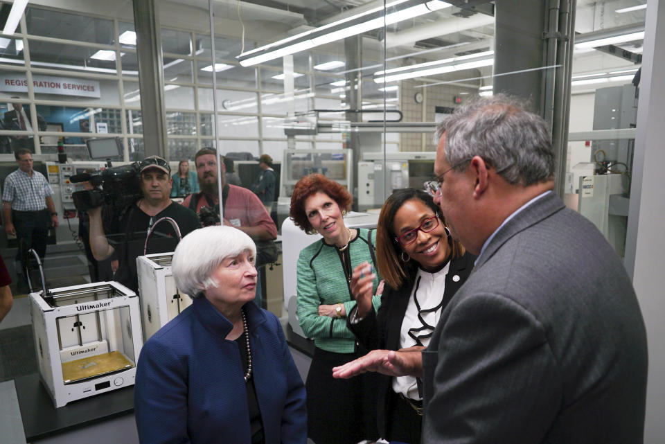 Federal Reserve Chair Janet Yellen, left, speaks to Arthur F. Anton, CEO of Swagelok, a manufacturing company, during a job training center tour in Cleveland, Ohio on Tuesday, Sept. 26, 2017. (AP Photo/Dake Kang)