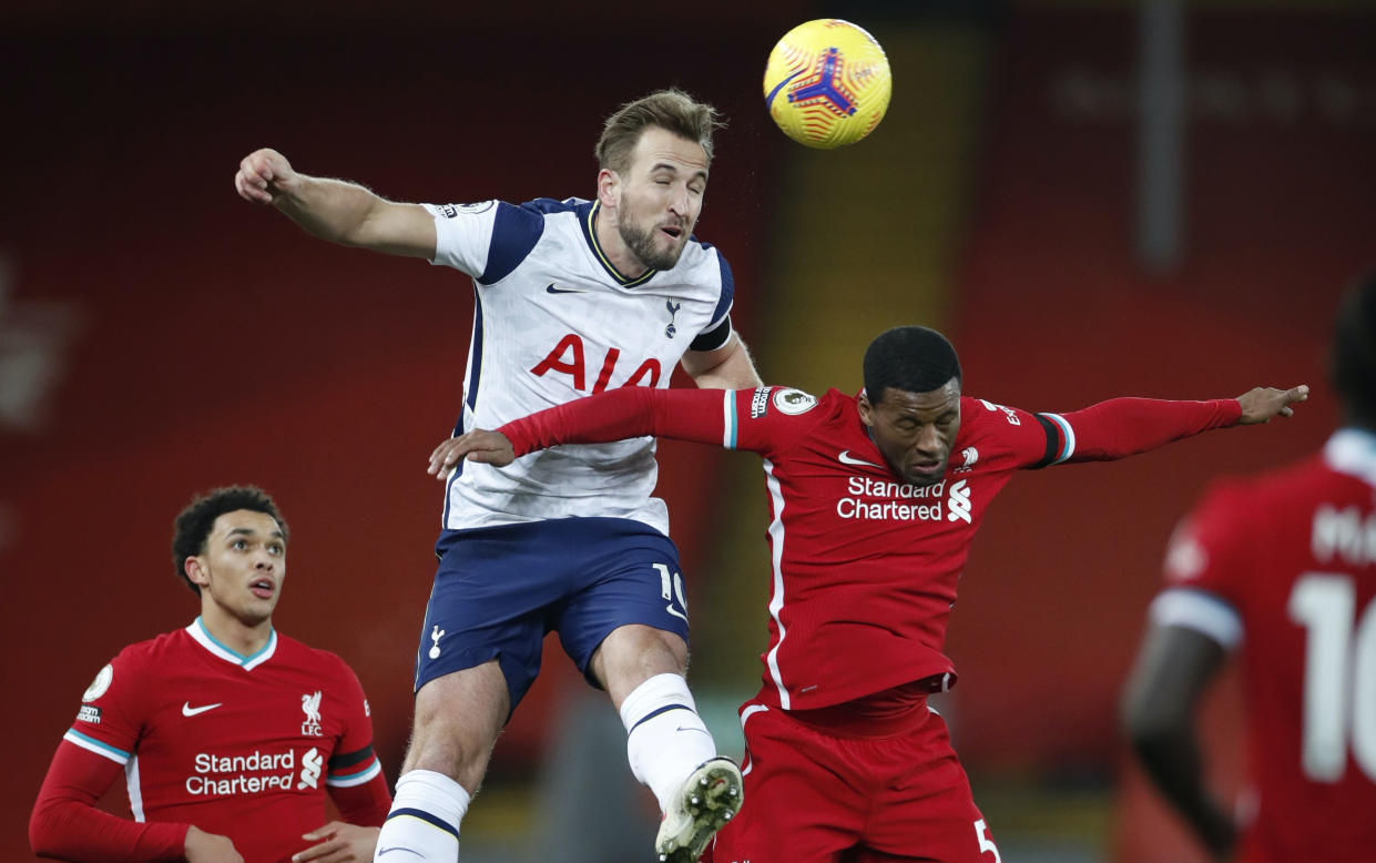 Tottenham Hotspur's Harry Kane in action with Liverpool's Georginio Wijnaldum. 