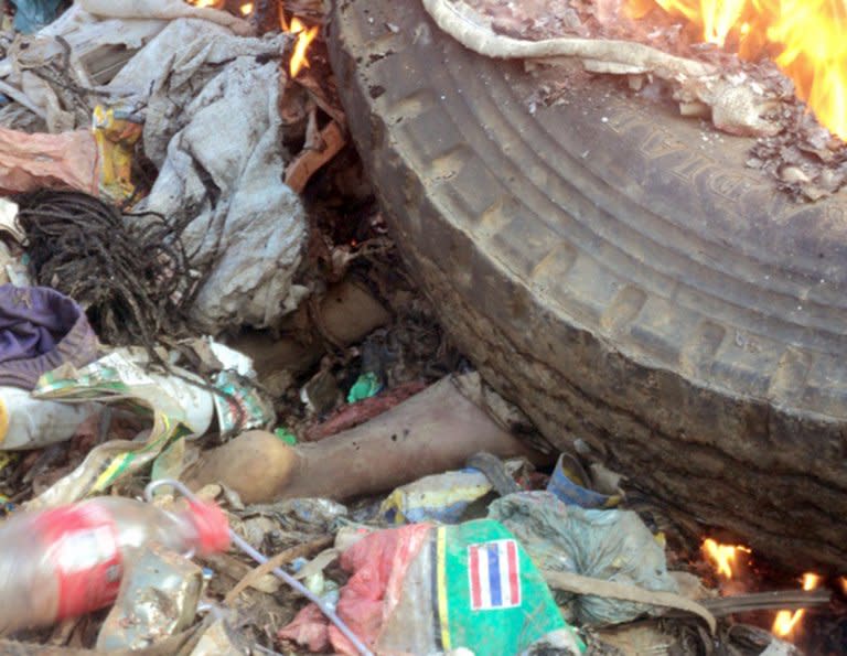 A young mother, accused of sorcery, was stripped naked, reportedly tortured with a branding iron, tied up, splashed with fuel and set alight on a pile of rubbish topped with car tyres, in Mount Hagen city in the Western Highlands of Papua New Guinea, on February 6, 2013. She was torched by villagers who claimed she killed a six-year-old boy through 'sorcery.'