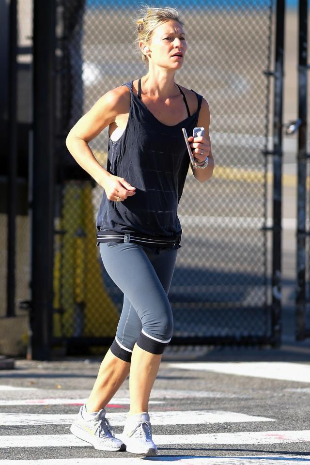 Dakota Fanning Slips On New Balance & Leggings for Gym Workout