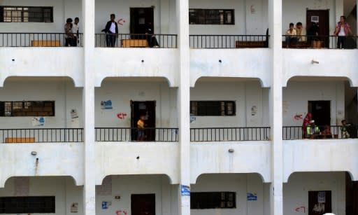 Yemenis who fled their homes in the war-torn port city of Hodeida are seen on June 22, 2018, at a school where they are seeking temporary shelter in the capital Sanaa