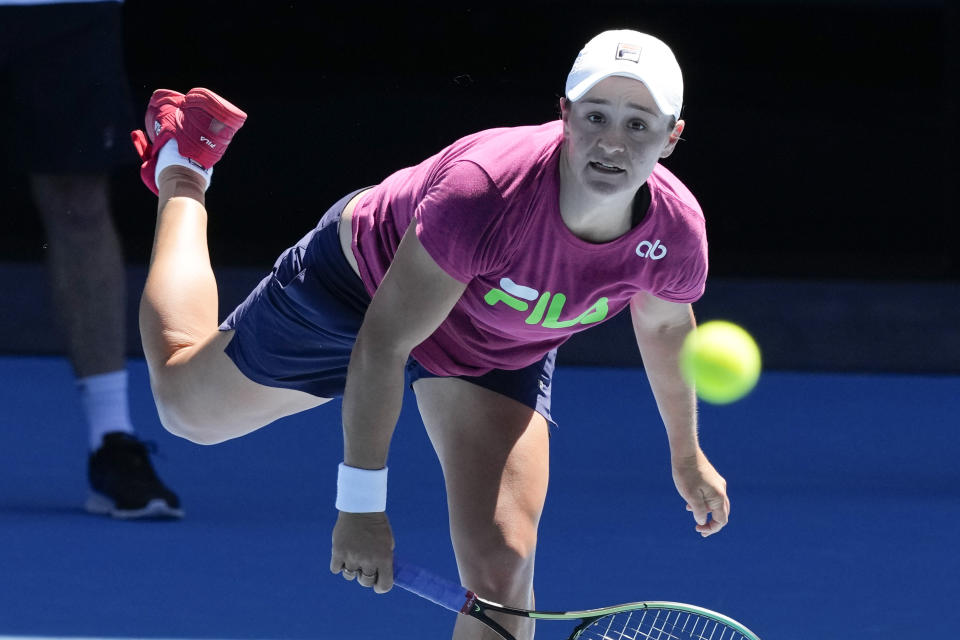 Australia's Ash Barty practices on Rod Laver Arena ahead of the Australian Open tennis championship at Melbourne Park, Australia, Wednesday, Jan. 12, 2022. (AP Photo/Mark Baker)