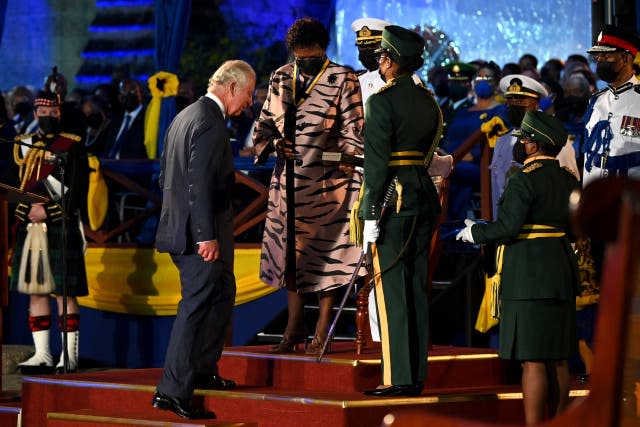 Charles receives the Freedom of Barbados award from President of Barbados, Dame Sandra Mason during the inauguration ceremony in 2021