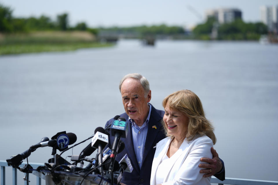 Sen. Tom Carper, D-Del., accompanied by his wife Martha, speaks during a news conference in Wilmington, Del., Monday, May 22, 2023. Carper announced Monday that he will not seek re-election to a fifth term in the U.S. Senate. (AP Photo/Matt Rourke)