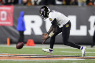 Baltimore Ravens quarterback Tyler Huntley chases a fumbled snap in the first half of an NFL wild-card playoff football game against the Cincinnati Bengals in Cincinnati, Sunday, Jan. 15, 2023. (AP Photo/Jeff Dean)