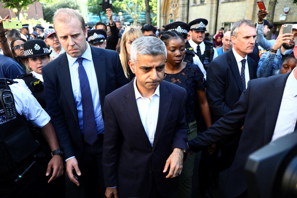 <p>London Mayor Sadiq Khan arrives to address a crowd of people near the scene of the fire which destroyed the Grenfell Tower block, in north Kensington, West London, Britain, June 15, 2017. (Photo: Neil Hall/Reuters) </p>