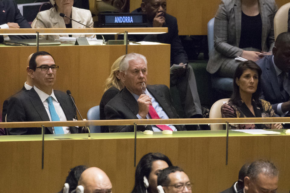 <p>Secretary of State Rex Tillerson, center, Ambassador to the United Nations Nikki Haley, right, and Secretary of the Treasury Steven Mnuchin listen as President Trump speaks during the 72nd session of the United Nations General Assembly at U.N. headquarters, Tuesday, Sept. 19, 2017. (Photo: Mary Altaffer/AP) </p>