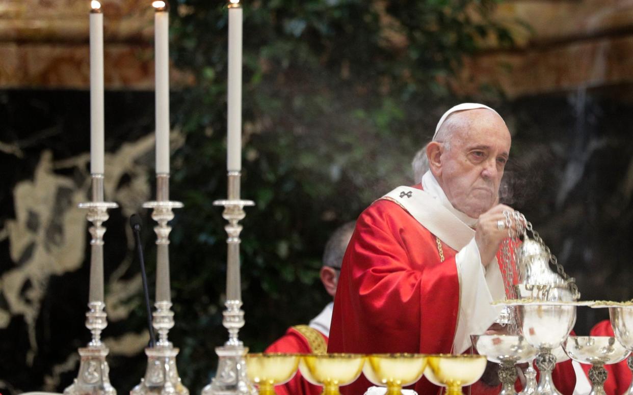 Pope Francis celebrates a Mass for cardinals and bishops who died in the past year, in St. Peter's Basilica at the Vatican, Nov. 4, 2019 - AP
