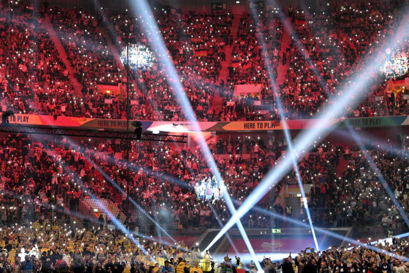 A general view of laser and light show at the opening ceremony of the European Handball Championship ahead of Group A match between Germany and Switzerland  at the Merkur Spiel-Arena. Federico Gambarini/dpa