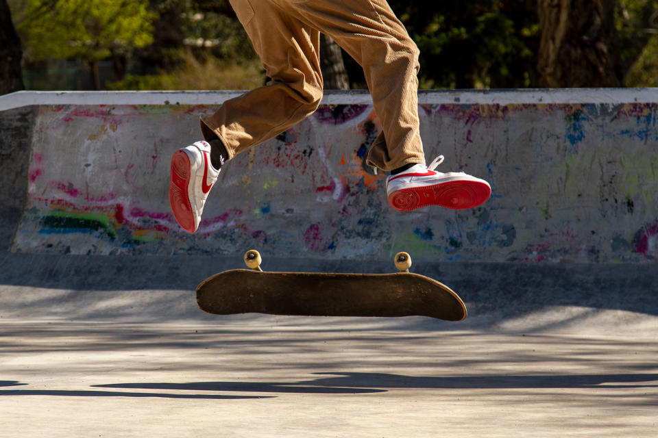 Francisco Pedraza Padilla Jr., 15, does a kick flip trick during an afternoon skating session with his friends. The three young men practice different tricks at the skatepark at least three times a week. Photo by Jarrette Werk (Underscore News/Report for America)