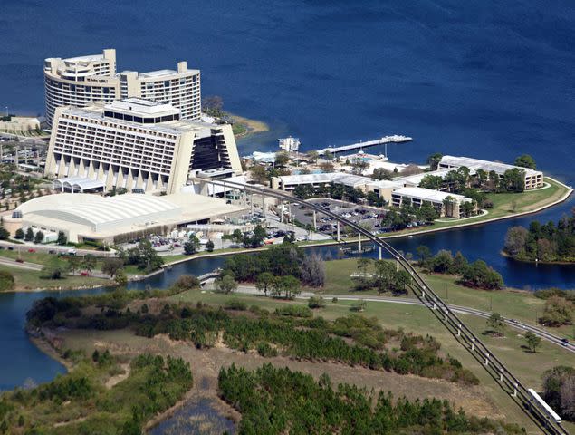 <p>©Jodi Jacobson/GettyImages </p> Disney World's Monorail zips right through the Contemporary Resort