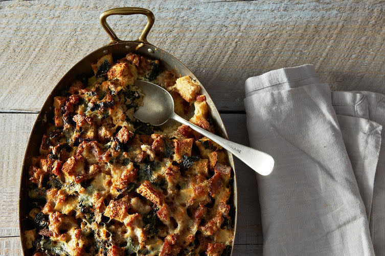 <p>This hardy brunch dish lets you do all the assembly the night before, and then just bake it before you’re ready to eat. <b>Try the <b><a href="https://www.food52.com/recipes/25367-strata-with-sausage-and-greens?utm_source=yahoofood&utm_medium=referral&utm_campaign=justoverthetopenoughholidaybreakfasts" rel="nofollow noopener" target="_blank" data-ylk="slk:Strata with Sausage and Greens;elm:context_link;itc:0;sec:content-canvas" class="link ">Strata with Sausage and Greens</a>.</b> </b><i>(Photo: <i>James Ransom/Food52)</i></i></p>