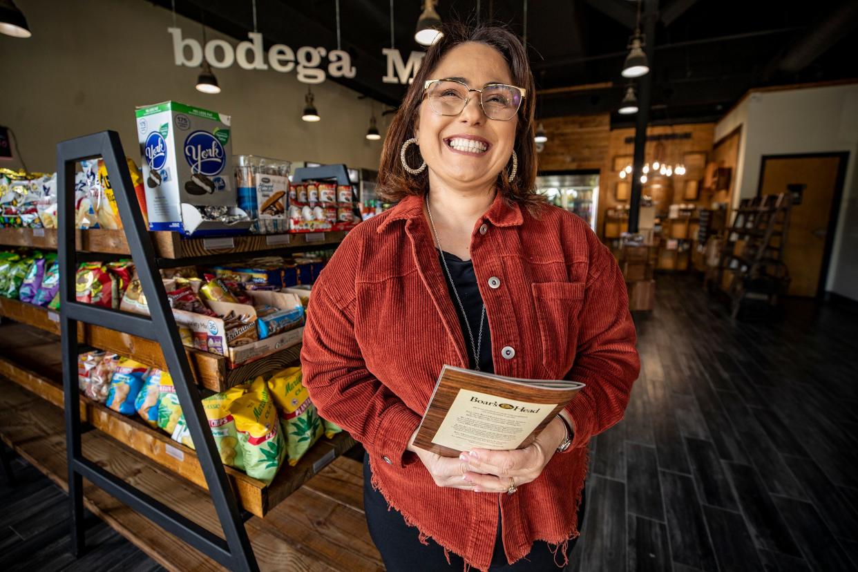 Yohansi Santana is the owner of the new Bodega Market near Munn Park in downtown Lakeland. The grocery and convenience store will celebrate its grand opening Saturday, Feb. 11.
