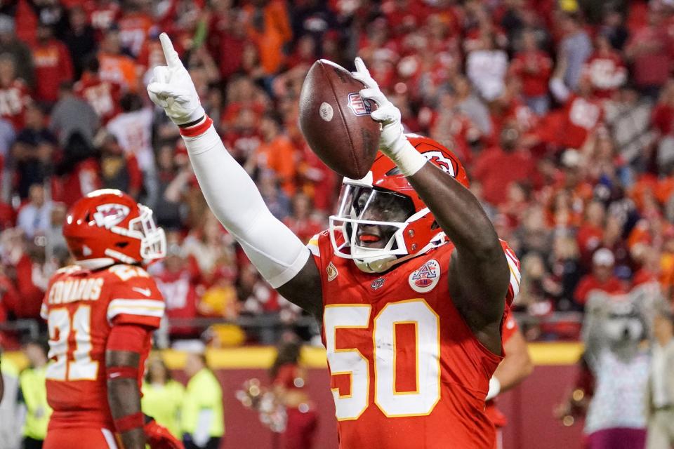 Kansas City Chiefs linebacker Willie Gay celebrates after recovering a fumble against the Denver Broncos during the second half at GEHA Field at Arrowhead Stadium.