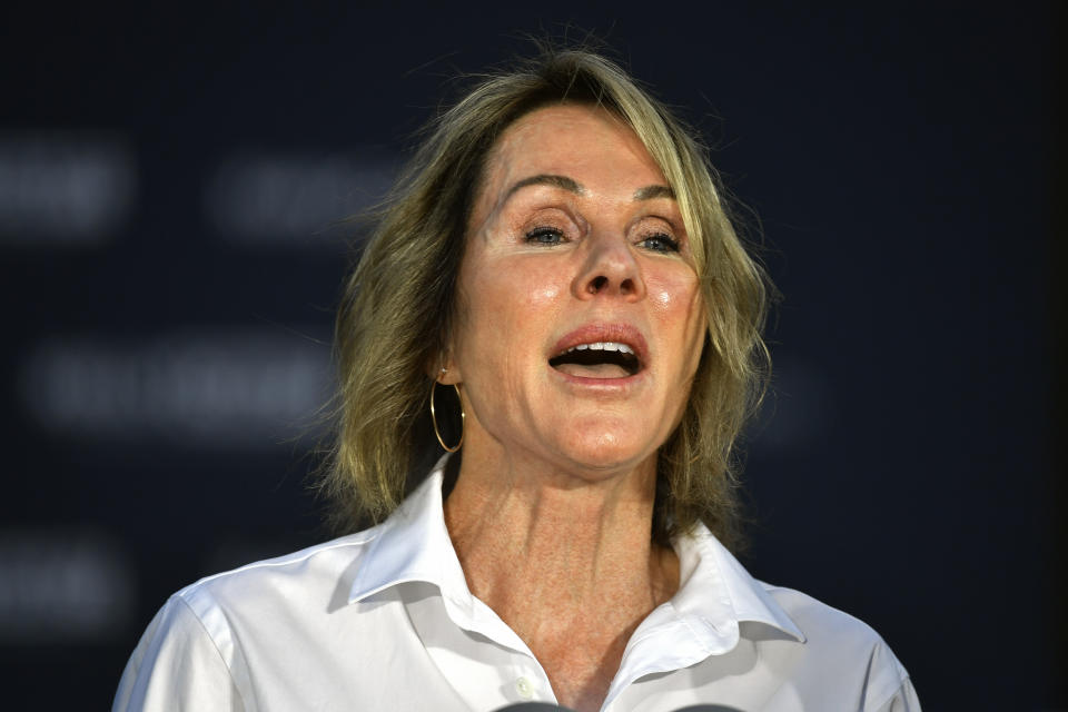 Kelly Craft, former U.S. Ambassador to the United Nations, stands on the steps of the Barren County Courthouse to announce her candidacy for Kentucky governor in Glasgow, Ky., Tuesday, Sept. 13, 2022. Craft, a Republican, enters a gubernatorial race that is already crowded with candidates. (AP Photo/Timothy D. Easley)