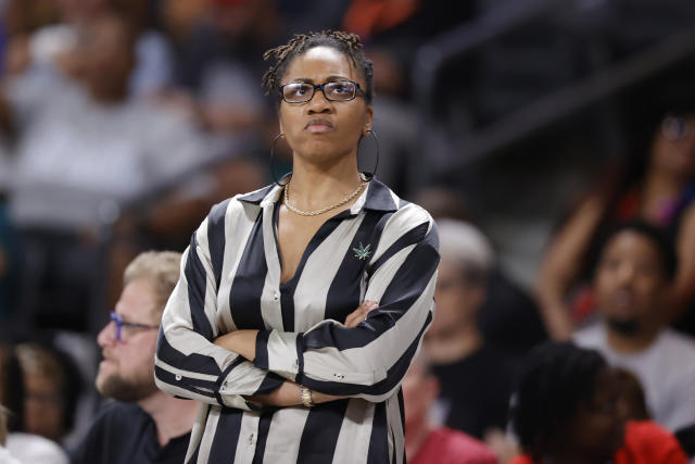 Atlanta Dream head coach Tanisha Wright works during a WNBA