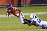 Chicago Bears' Darnell Mooney (11) is tackled by Indianapolis Colts' Kenny Moore II (23) during the second half of an NFL football game Sunday, Oct. 4, 2020, in Chicago. (AP Photo/Nam Y. Huh)