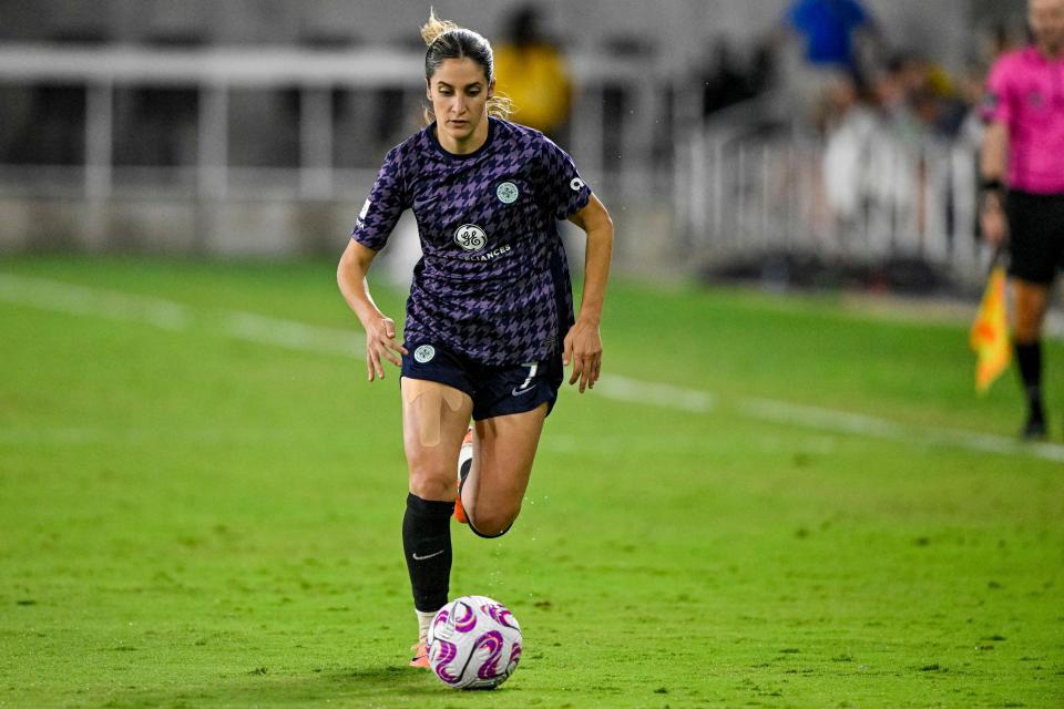 Aug 19, 2023; Louisville, Kentucky, USA; Racing Louisville FC midfielder Savannah DeMelo (7) dribbles the ball during the second half at Lynn Family Stadium. Mandatory Credit: Jamie Rhodes-USA TODAY Sports