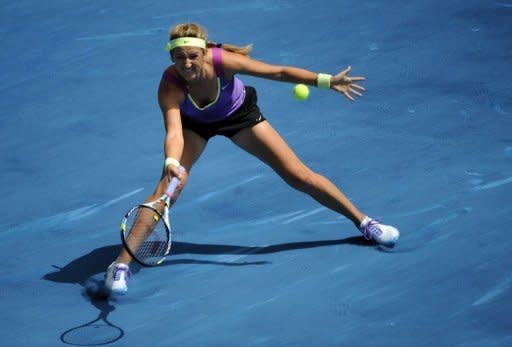 Belarussian Victoria Azarenka returns a ball to China's Li Na during the Madrid Masters. Top seed Azarenka saw off Li with a 3-6, 6-3, 6-3 battling win into the semi-finals of the Madrid Masters on Friday