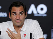 Switzerland's Roger Federer answers questions during a press conference ahead of the Australian Open tennis championship in Melbourne, Australia, Saturday, Jan. 18, 2020. (AP Photo/Andy Wong)