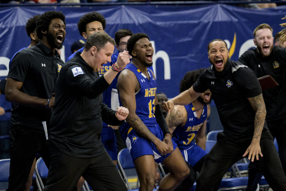 McNeese State coach Will Wade, second lfrom eft, reacts with his team during an NCAA college basketball game against New Orleans in New Orleans, Wednesday, March 6, 2024. Wade was suspended for the first 10 games of the 2023–24 season by the NCAA but the team went to a 28-3 record and finished first in the Southland Conference. (AP Photo/Matthew Hinton)