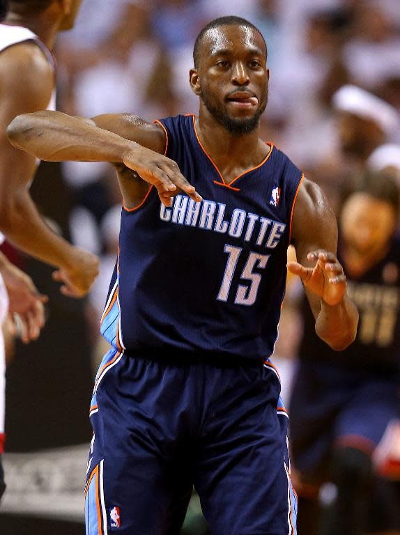 Kemba Walker of the Charlotte Bobcats, seen in action during Game 1 against the Miami Heat, in Eastern Conference quarter-finals of the 2014 NBA Playoffs, at American Airlines Arena in Miami, Florida, on April 20, 2014