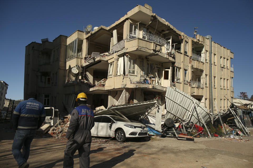 A damaged building in Adiyaman, southern Turkey, Thursday, Feb. 9, 2023. Thousands who lost their homes in a catastrophic earthquake huddled around campfires and clamored for food and water in the bitter cold, three days after the temblor and series of aftershocks hit Turkey and Syria. ( AP Photo/Emrah Gurel)