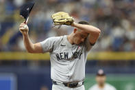 New York Yankees relief pitcher Nick Burdi] reacts after walking Tampa Bay Rays' Josh Lowe during the seventh inning of a baseball game Sunday, May 12, 2024, in St. Petersburg, Fla. (AP Photo/Mike Carlson)