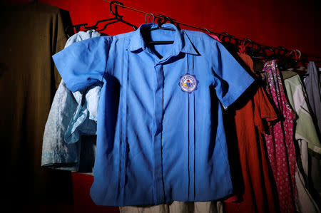 A school uniform of Kian Loyd delos Santos, a 17-year-old student who was shot during an anti-drug operations, is pictured inside Kian's house in Caloocan, Metro Manila, Philippines August 24, 2017. REUTERS/Erik De Castro