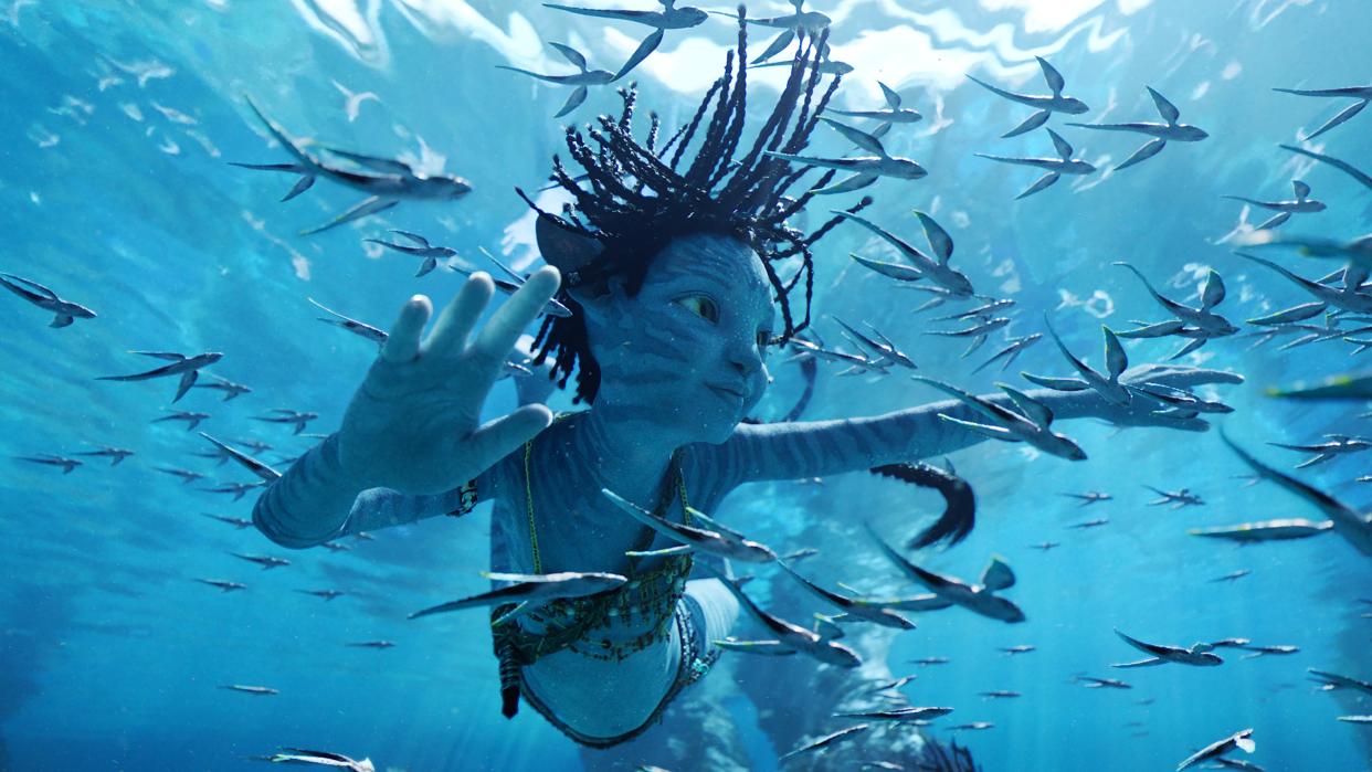  A screenshot of Tuk swimming in Avatar: The Way of Water, one of the best James Cameron movies. 