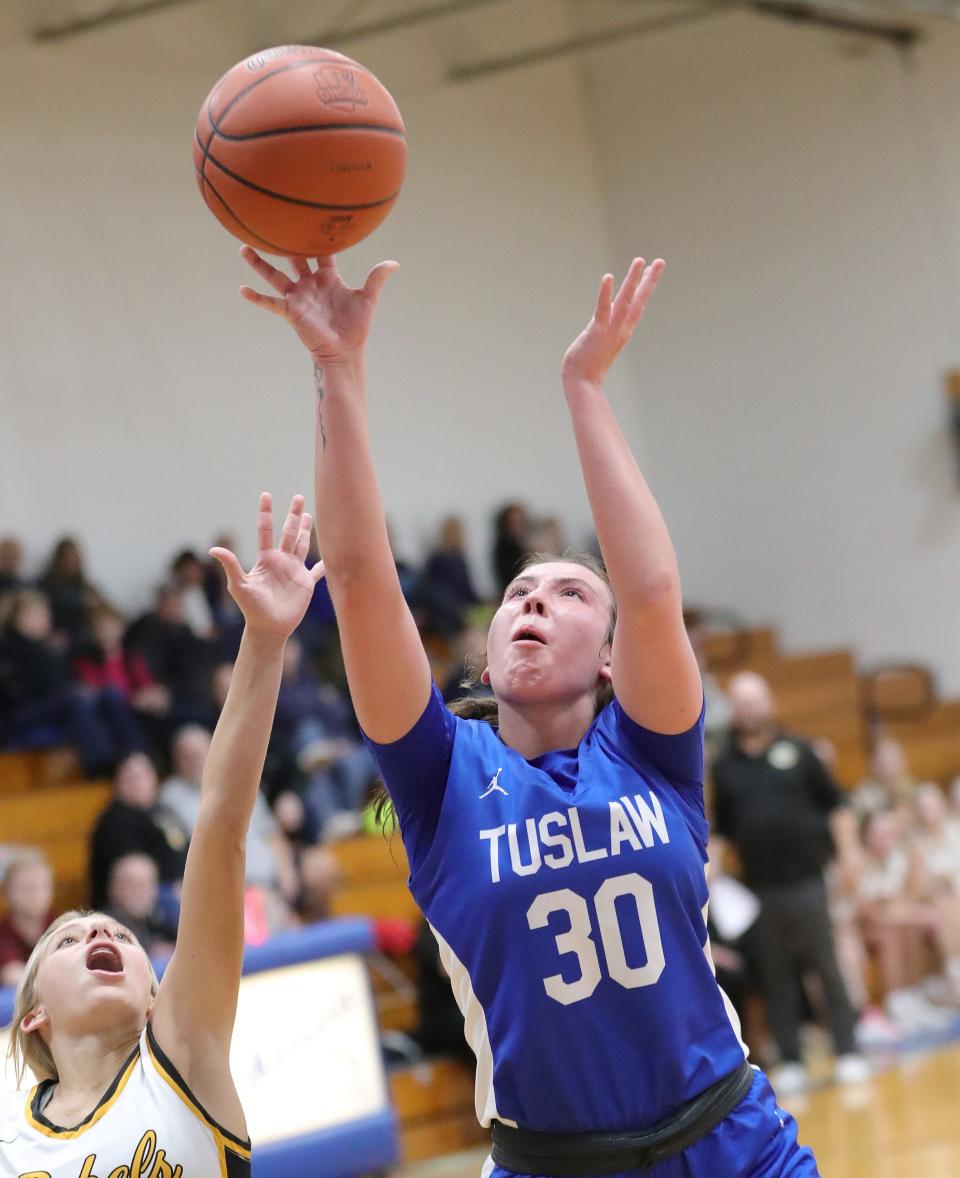 Tuslaw's Malia Mizeres puts up a shot defended by Crestview's Kerrigan Miller on Wednesday.