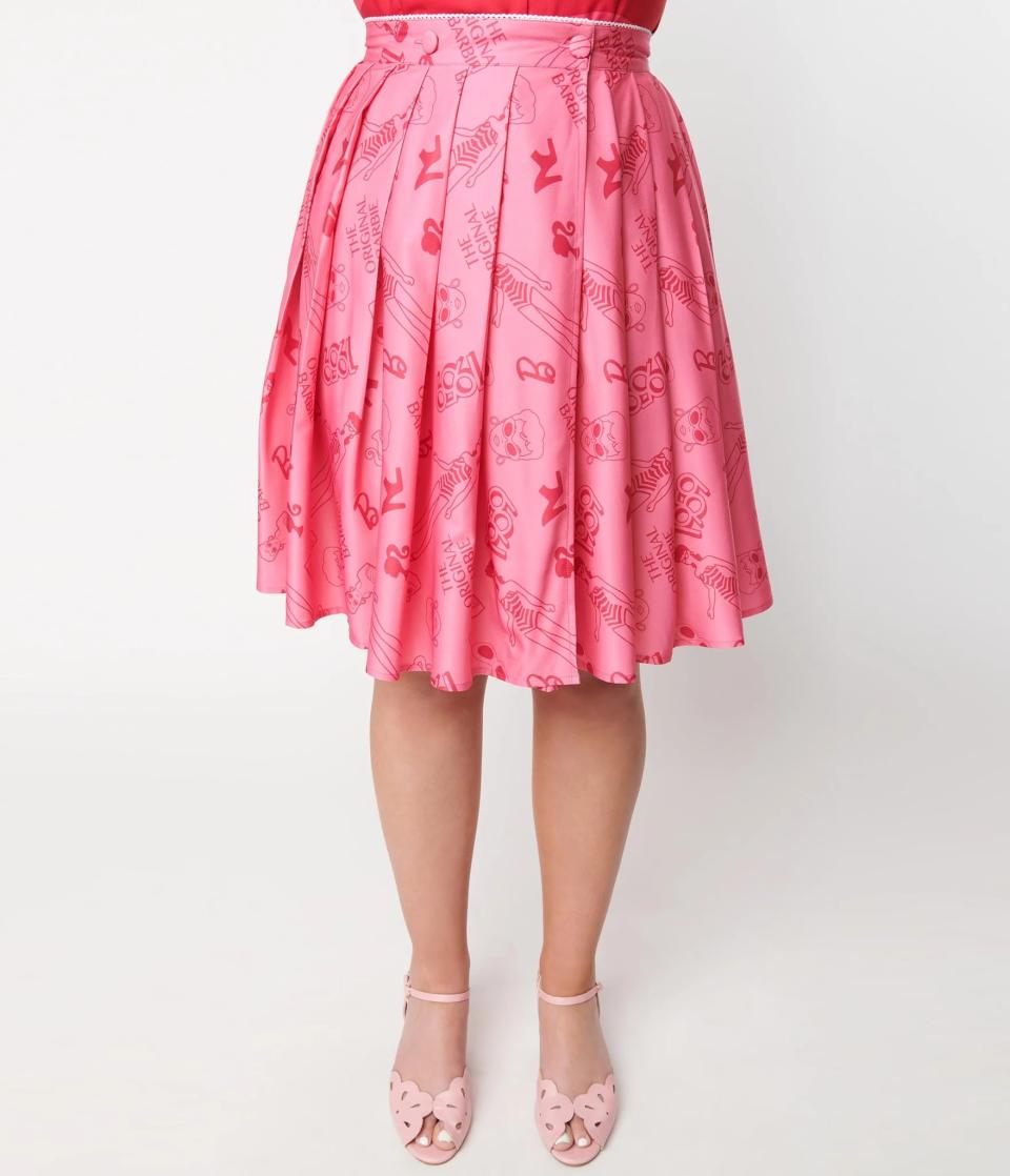 model wearing skirt with printed barbie pattern