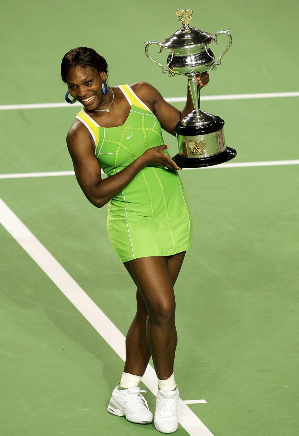 Serena Williams of the USA poses with the trophy after winning her women's final match against Maria Sharapova of Russia on day thirteen of the Australian Open 2007 at Melbourne Park on January 27, 2007 in Melbourne, Australia