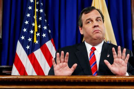 FILE PHOTO -- New Jersey Governor Chris Christie reacts to a question during a news conference in Trenton, New Jersey, U.S. on March 28, 2014. REUTERS/Eduardo Munoz/File Photo