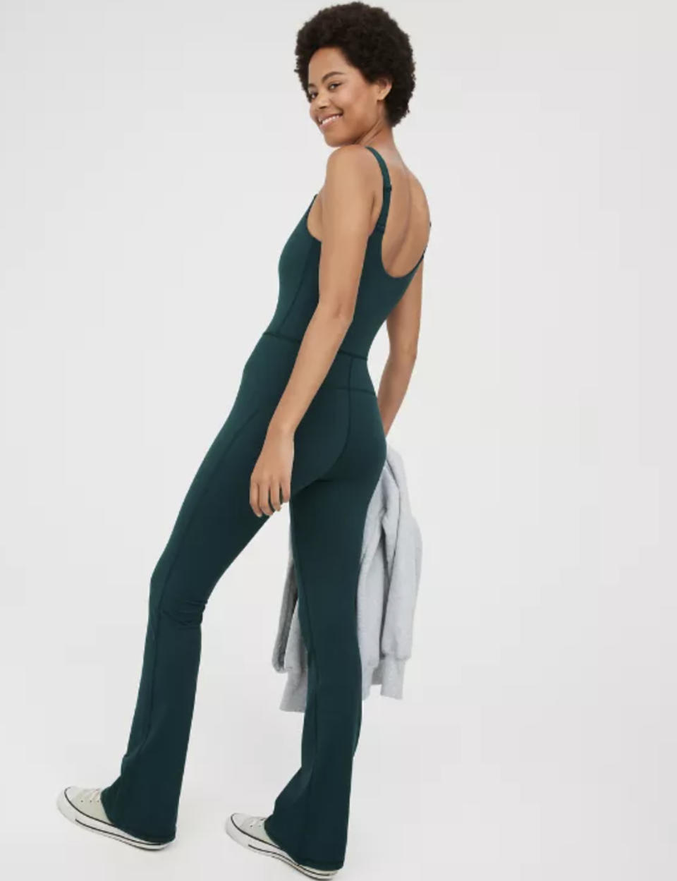 Model in the teal jumpsuit