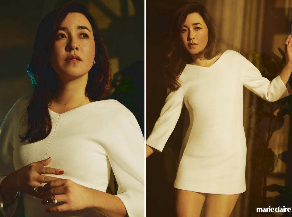 Actress Maya Erskine in a white dress