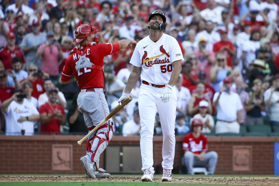 St. Louis Cardinals' Adam Wainwright (50) walks to the dugout after striking out during the eighth inning of a baseball game against the Cincinnati Reds, Sunday, Oct. 1, 2023, in St. Louis. (AP Photo/Scott Kane)