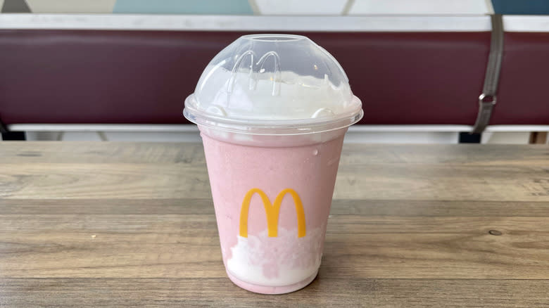 Strawberry milkshake on table