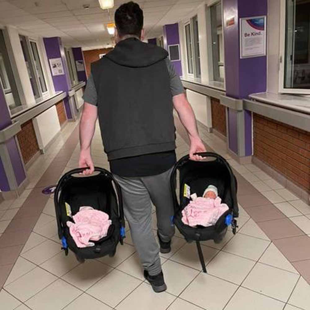 Joe taking the baby twins home (Collect/PA Real Life).