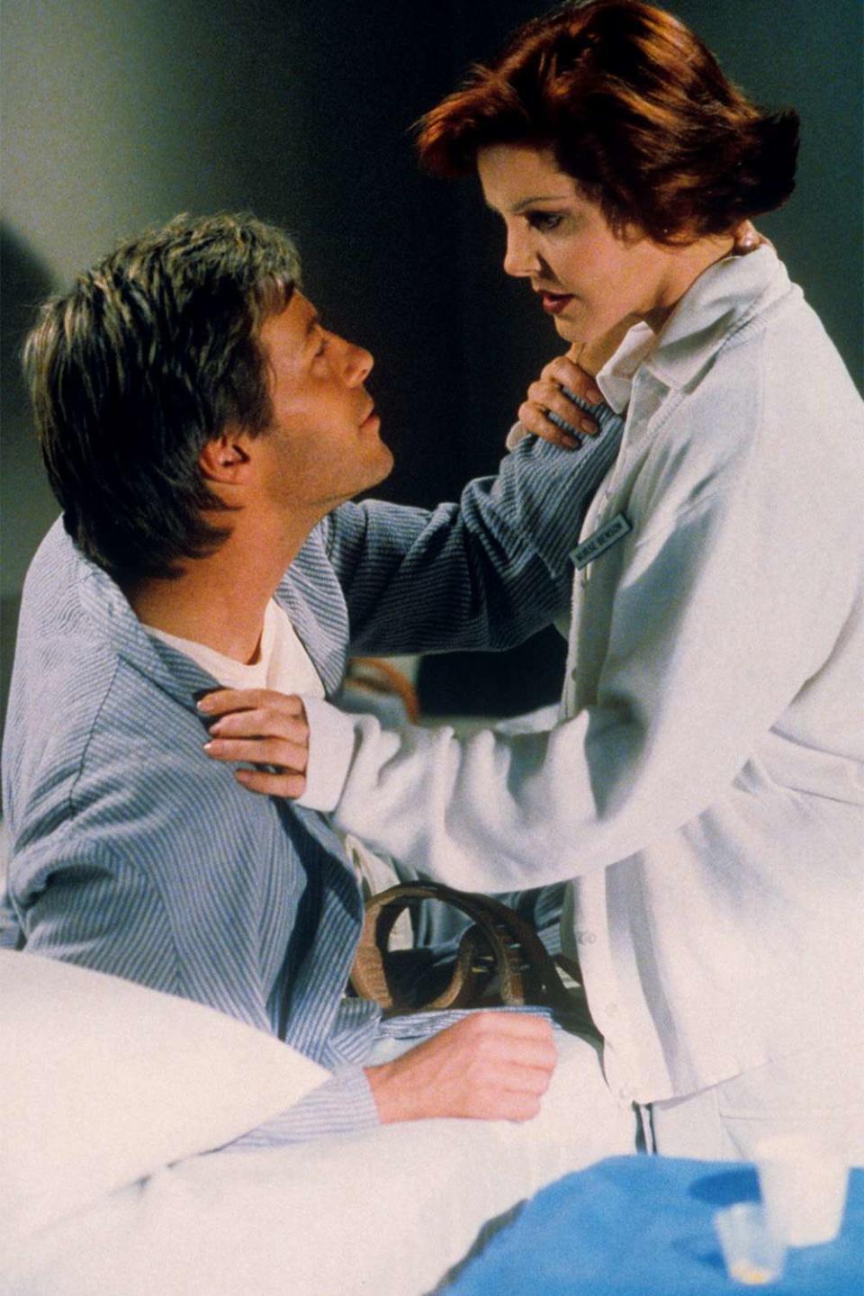 <p>She also found a new audience in the '90s as Nurse Benson on a handful of episodes of <em>Melrose Place</em> (here with Jack Wagner).</p>