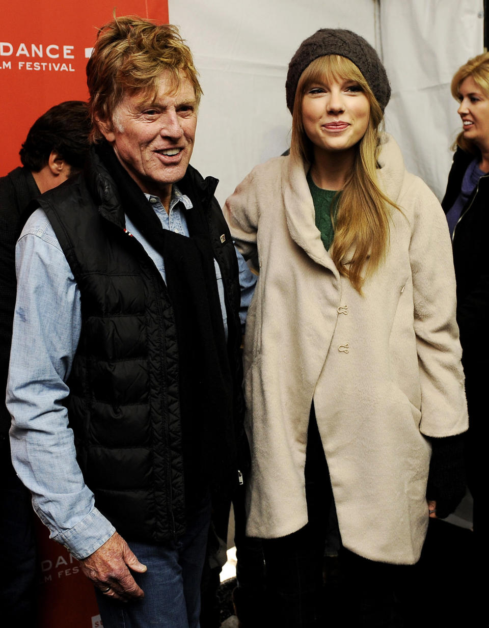 FILE - In this Jan. 20, 2012 file photo, Robert Redford poses with singer Taylor Swift at the premiere of the documentary film "Ethel" at the 2012 Sundance Film Festival in Park City, Utah. (AP Photo/Chris Pizzello, File)