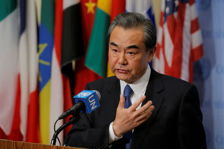Wang Yi, Chinese Minister for Foreign Affairs, speaks before a meeting of the Security Council inside of United Nations (U.N.) headquarters in New York, U.S., April 28, 2017. REUTERS/Lucas Jackson