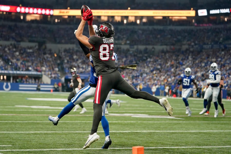 Tampa Bay Buccaneers tight end Payne Durham (87) catches the ball during the first half of an NFL football game against the Indianapolis Colts Sunday, Nov. 26, 2023, in Indianapolis. (AP Photo/Michael Conroy)