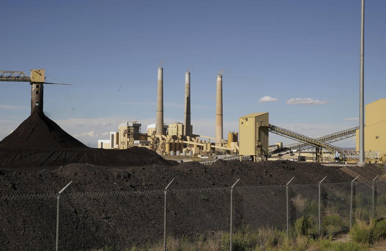 PacifiCorp's Hunter coal-fired power plant in Utah is scheduled to shut down by 2032. <a href="https://www.gettyimages.com/detail/news-photo/large-coal-piles-sits-in-front-of-pacificorps-hunter-320-news-photo/1150839861" rel="nofollow noopener" target="_blank" data-ylk="slk:George Frey/Getty Images;elm:context_link;itc:0;sec:content-canvas" class="link ">George Frey/Getty Images</a>