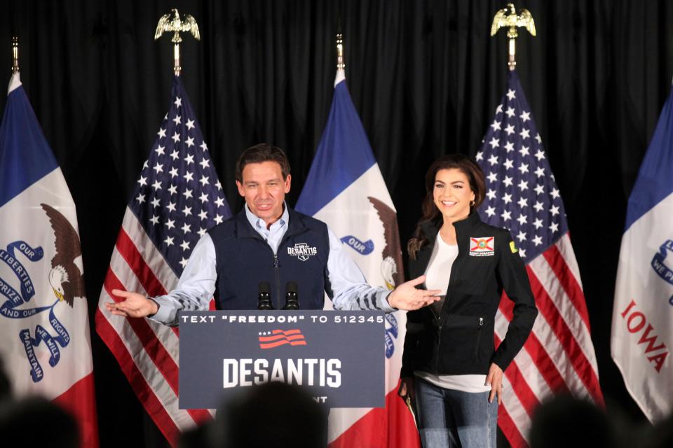 Florida Gov. Ron DeSantis introduces his wife Casey DeSantis to voters at a rally in Council Bluffs, Iowa, Wednesday. Several hundred people filled half of an event center to listen to DeSantis speak in his first trip to Iowa since announcing his presidential campaign. (AP Photo/Josh Funk)